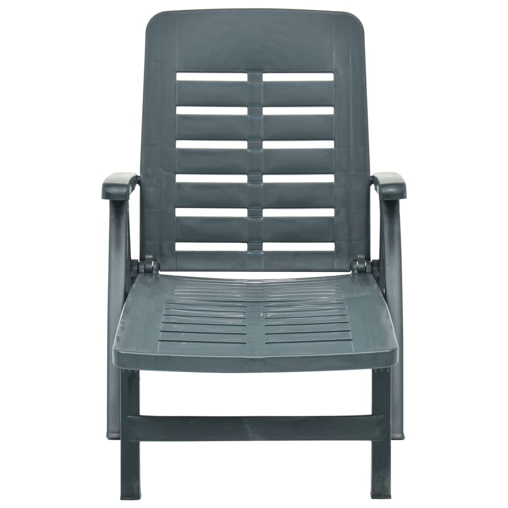 Green plastic folding sun lounger
