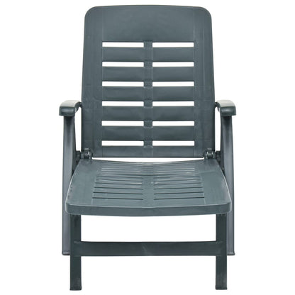 Green plastic folding sun lounger