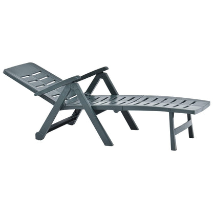 Green plastic folding sun lounger