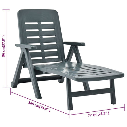 Green plastic folding sun lounger
