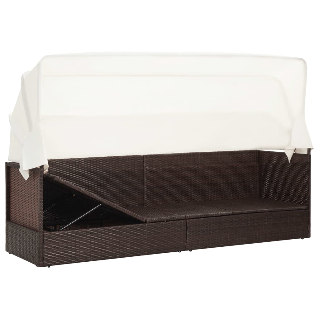 Brown wicker garden sofa with awning