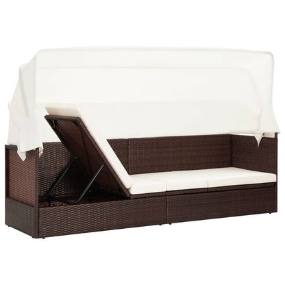 Brown wicker garden sofa with awning