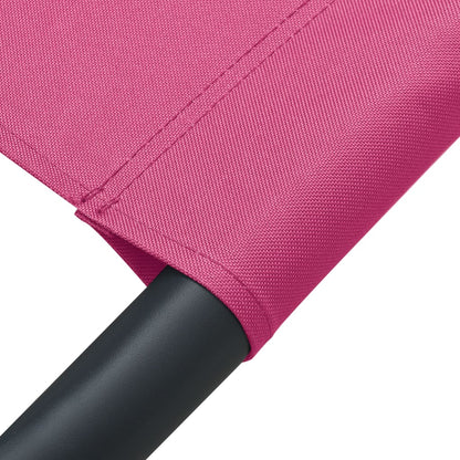 Sun lounger with canopy and pink cushion