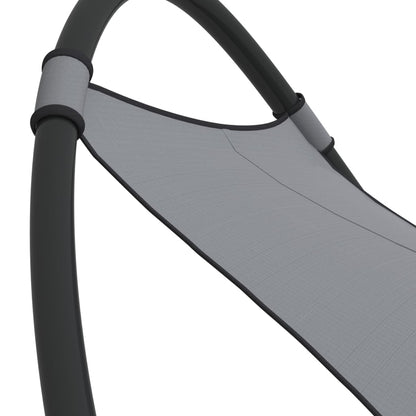 Rocking sun lounger with steel and grey textilene wheels