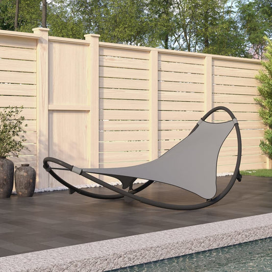 Rocking sun lounger with steel and grey textilene wheels
