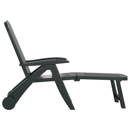 Green polypropylene folding sun lounger