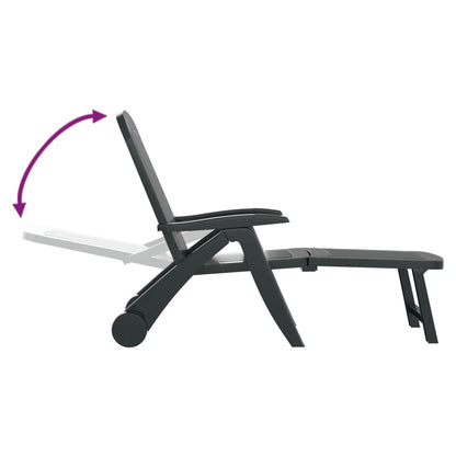 Green polypropylene folding sun lounger