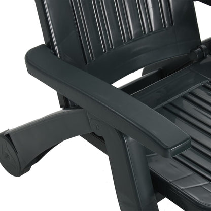 Green polypropylene folding sun lounger