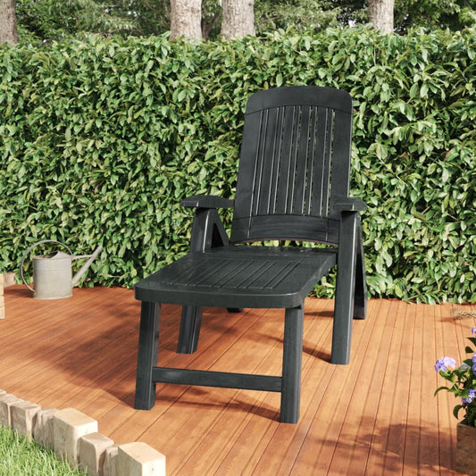 Green polypropylene folding sun lounger