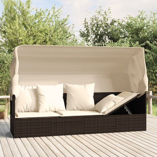 Outdoor lounge sofa with awning and cushions in brown poly rattan