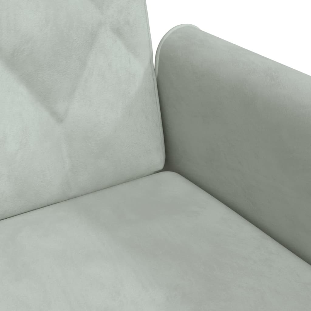 Light grey velvet sofa bed with armrests