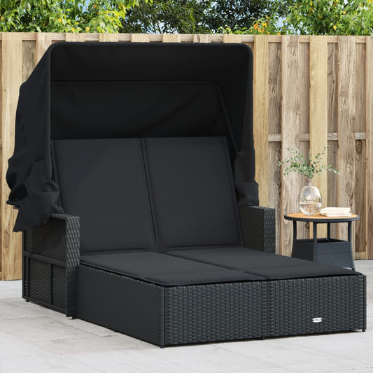 Double sun lounger with canopy and cushions in black poly rattan
