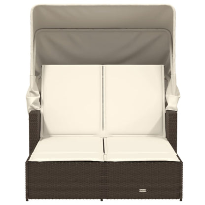 Double sun lounger with canopy and cushions in brown poly rattan