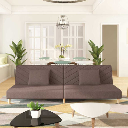 2-seater sofa bed with two cushions in grey-brown fabric