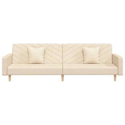2-seater sofa bed with two cushions in cream-colored fabric