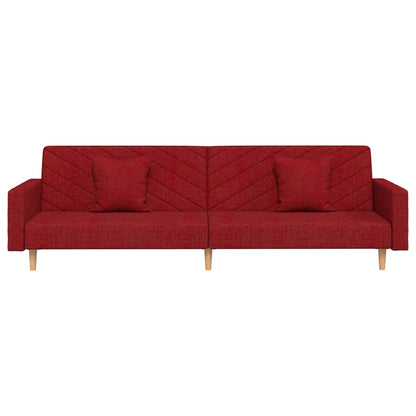 2-seater sofa bed with two cushions in red fabric