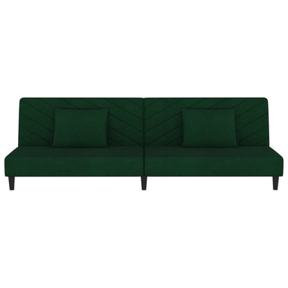 2-seater sofa bed with two dark green velvet cushions