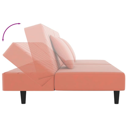 2-seater sofa bed with two pink velvet cushions