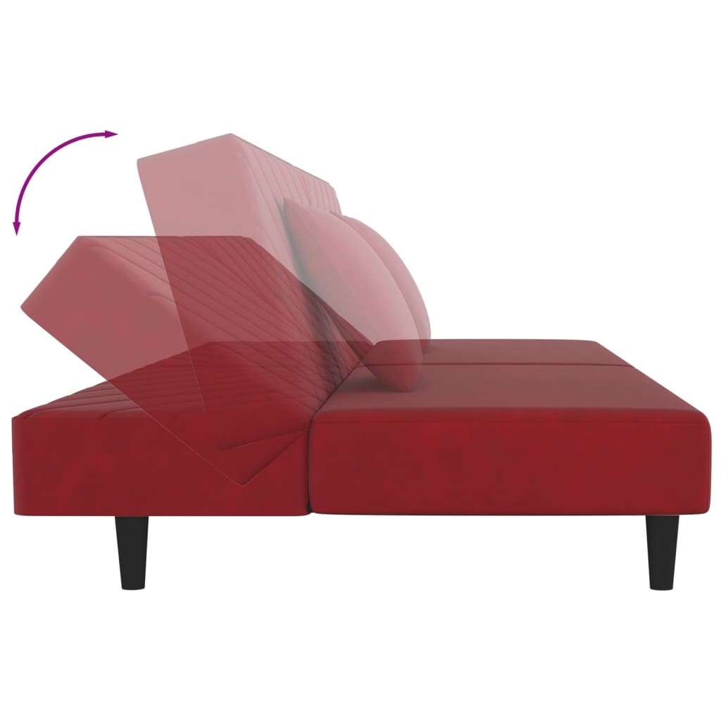 2-seater sofa bed with two red velvet cushions