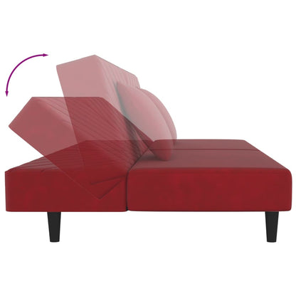 2-seater sofa bed with two red velvet cushions