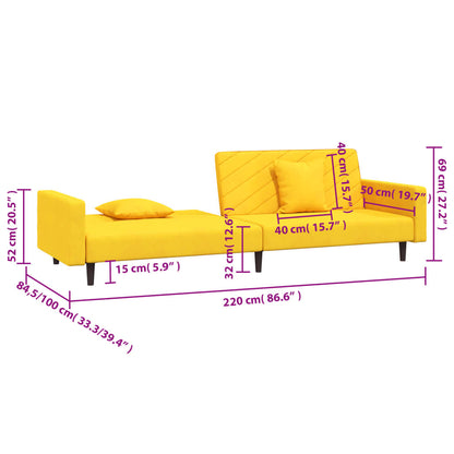 2-seater sofa bed with two yellow velvet cushions