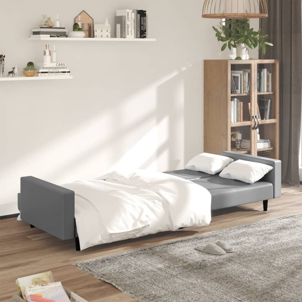 2-seater sofa bed in grey faux leather
