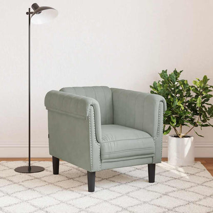 Light grey velvet armchair