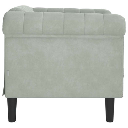 Light grey velvet armchair