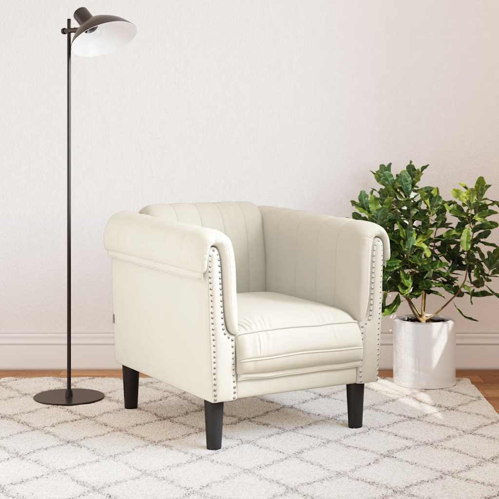 Cream colored velvet armchair