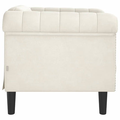 Cream colored velvet armchair