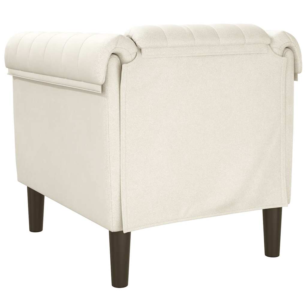 Cream colored velvet armchair