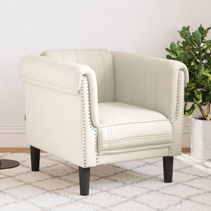 Cream colored velvet armchair
