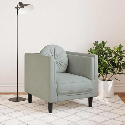 Armchair with light grey velvet cushion