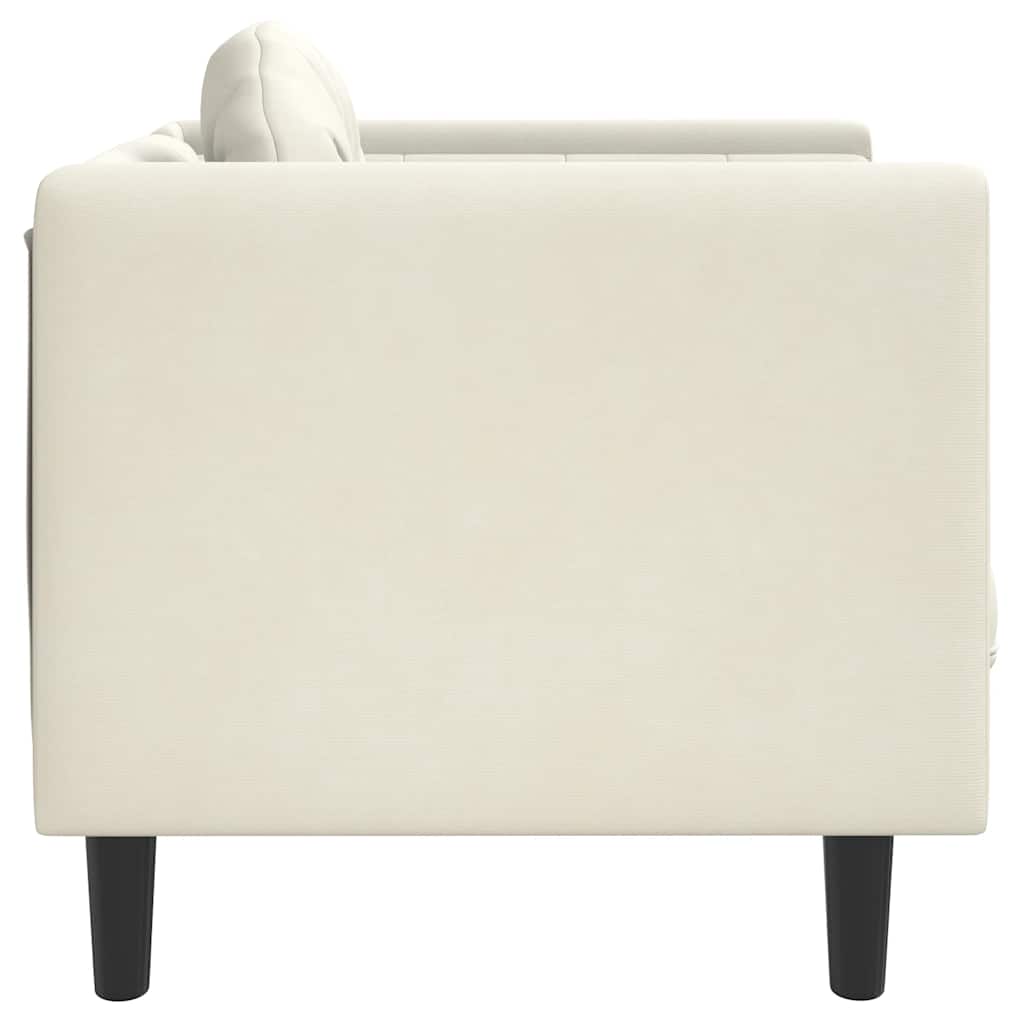 Armchair with cream-colored velvet cushions