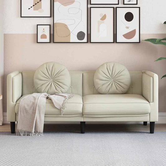 2-seater cream velvet sofa with cushions