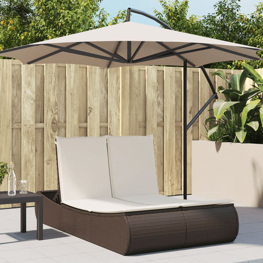 Double sun lounger with cushions in brown poly rattan