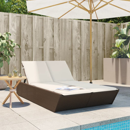 Double sun lounger with cushions in brown poly rattan