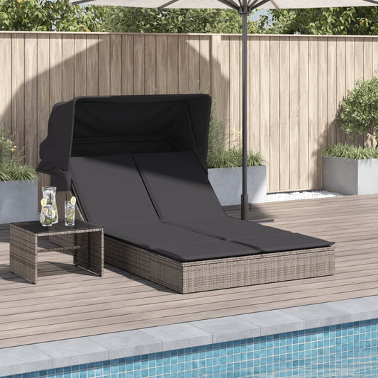 Double sun lounger with canopy and cushions in grey poly rattan